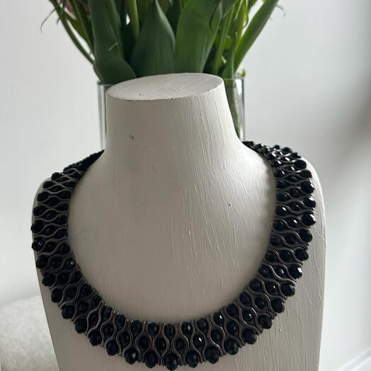 Black and silver color necklace
