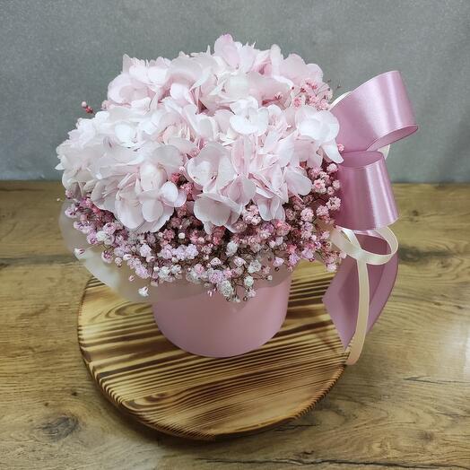 Pink hydrangea with rainbow gypsophila in a hatbox