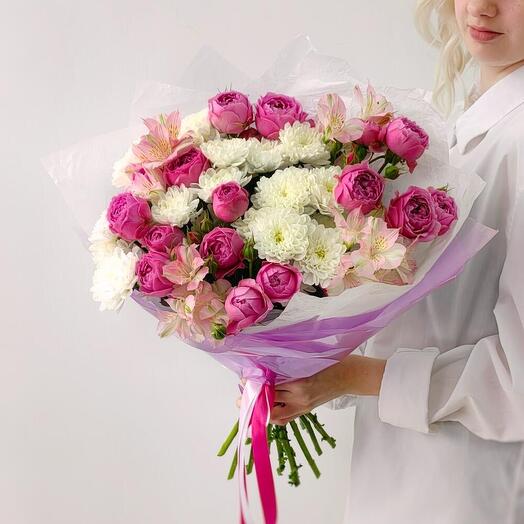 A large bouquet with pin-shaped bush roses and chrysanthemum