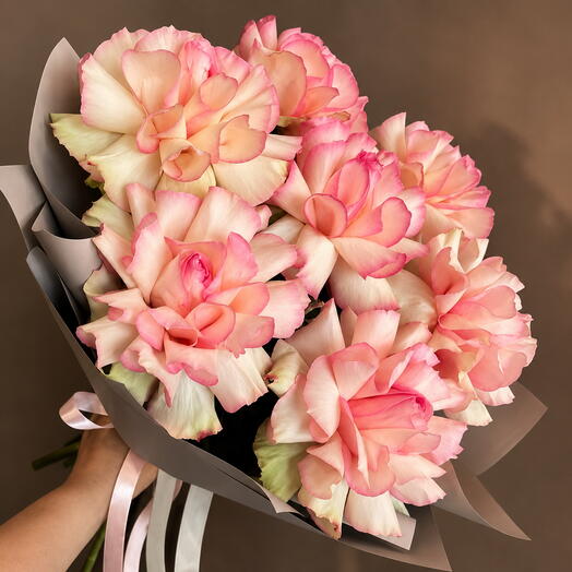 Bouquet of French roses in a package