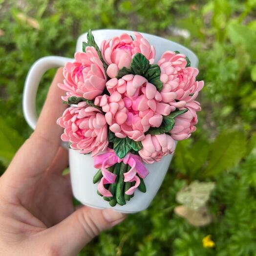 A mug with an orchid