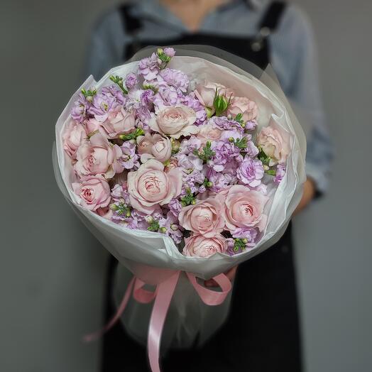 Pink bouquet of bushy peony-shaped roses and mattiola