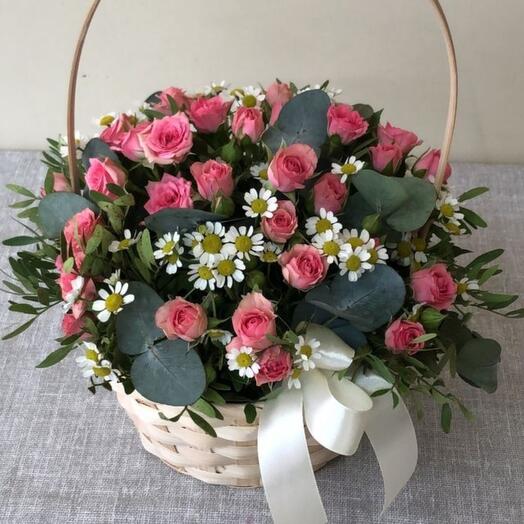 Fragrant basket with bush rose and daisies