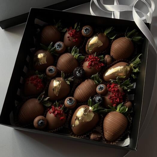 Chocolate-covered strawberries with blueberries