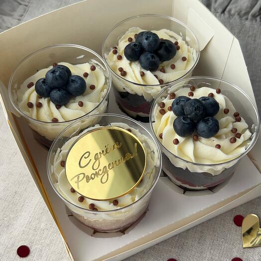 Set of happy birthday trifles with blueberries