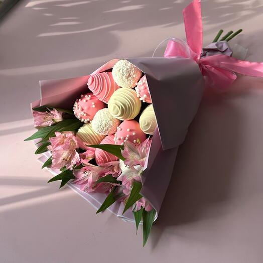 A bouquet of chocolate-covered strawberries for her