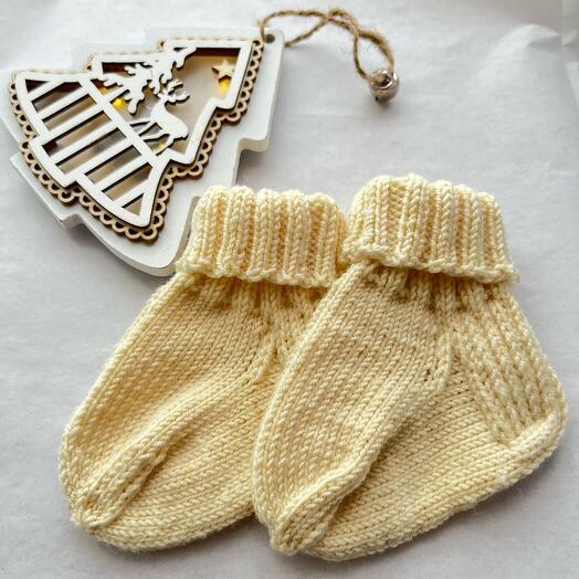 Socks for a newborn made of merino wool