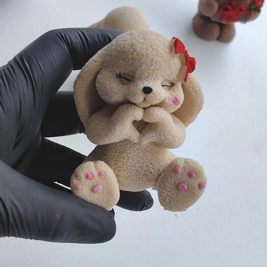 Figurine "Bunny with a bow", made of white chocolate colored with cocoa powder