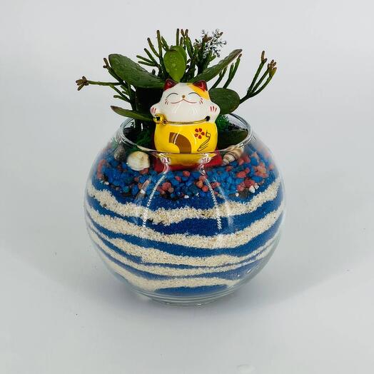 Mini florarium with fresh flowers succulents and a money cat for office desk