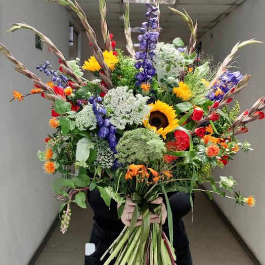 A very large field bouquet with sunflowers