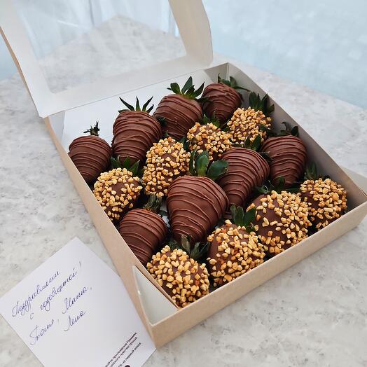 Strawberries in milk chocolate with nuts