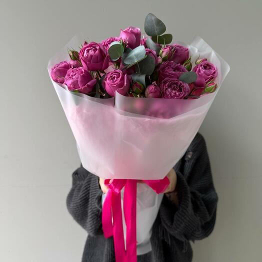 Bright bush rose with eucalyptus