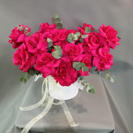 Bright French roses in a box