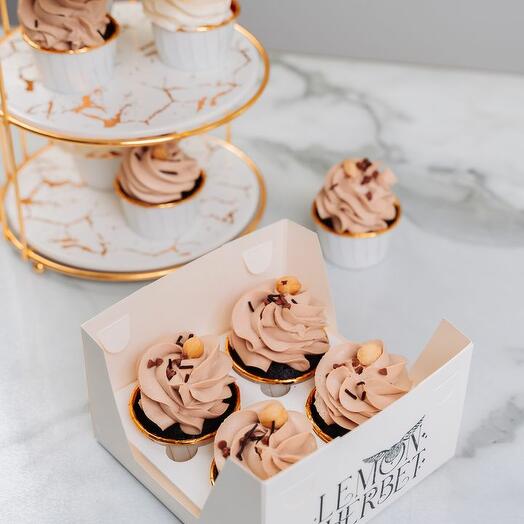 Set of 4 chocolate cupcakes with caramel and chocolate chips as a gift