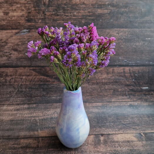 Статица в гипсовой вазе