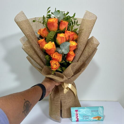 Orange Delight Combo  11 Orange Roses with Pistachio Kunafa Chocolates