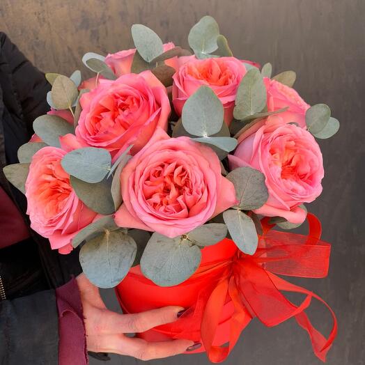 Peony pink express roses with eucalyptus in a hatbox