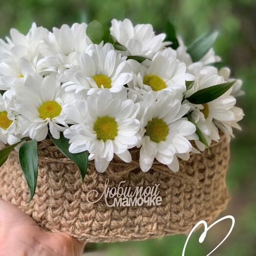 Chrysanthemums and daisies in a basket
