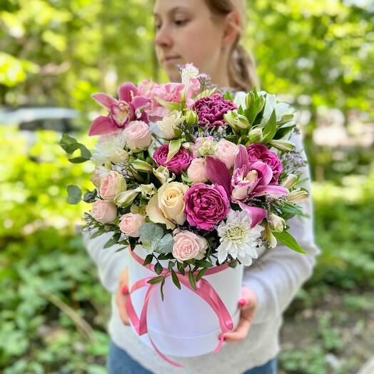 Flowers in a box with orchids