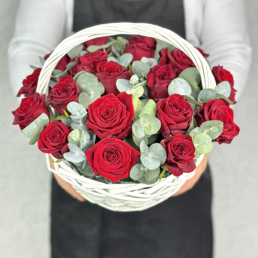 Basket of 19 roses with eucalyptus