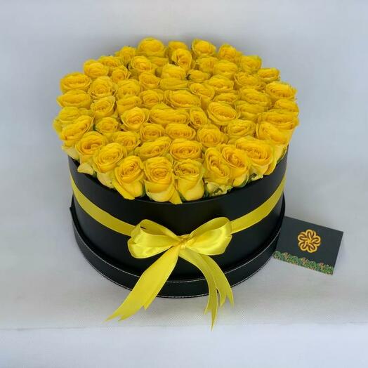 Yellow roses in black box