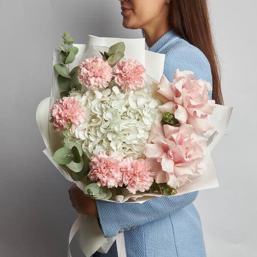 Delicate bouquet with hydrangea and French roses
