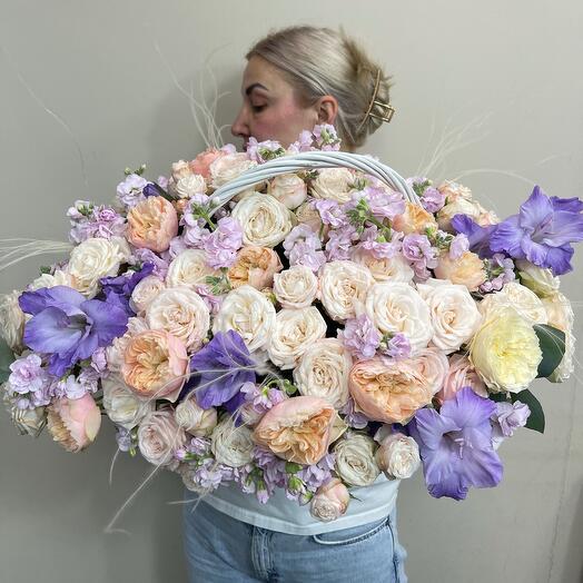 A peony-shaped rose with fragrant mattiola in a basket