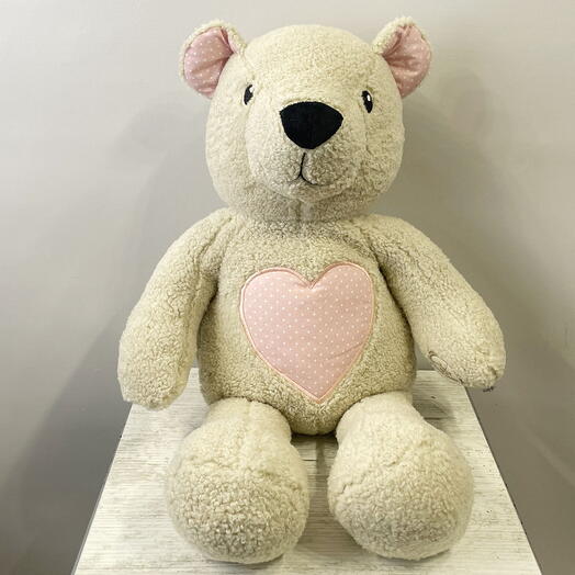 Grey Teddy bear with a pink heart