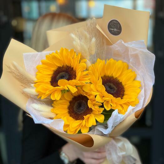 Bouquet of sunflowers and dried flowers
