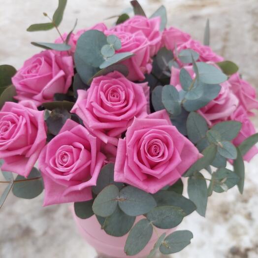 A box with a pink rose