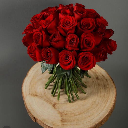 Deep red rose with clear vase