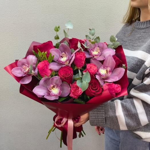 Bright bouquet with orchid and roses