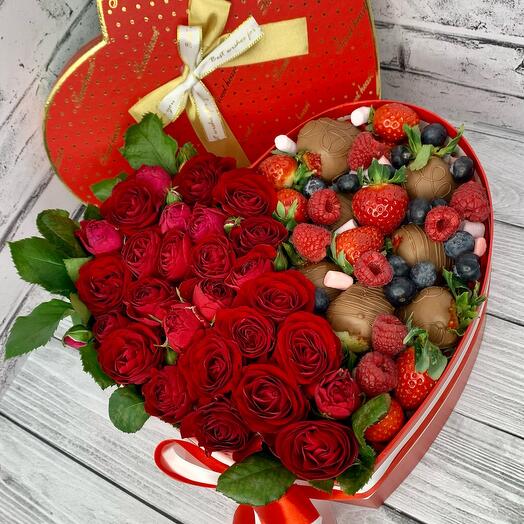 Heart with roses and strawberries in chocolate