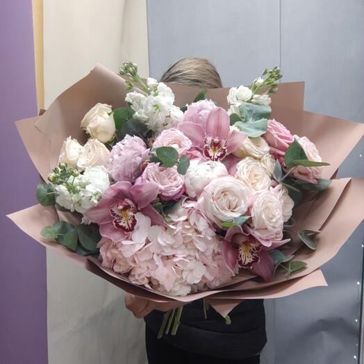 Bouquet of peonies, bush roses, orchids, hydrangeas, mattioles, eucalyptus