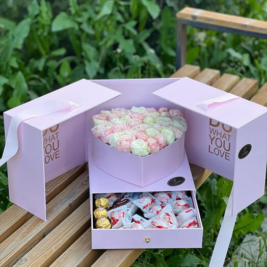 Flowers and chocolates  in a box