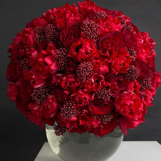 Full of red mix round table arrangement