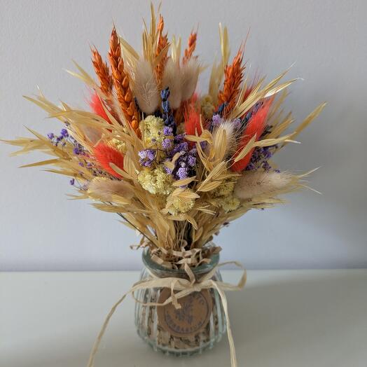 Centro de mesa con flores amarilla