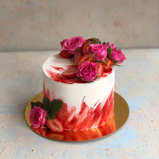 Cake with berries and flowers