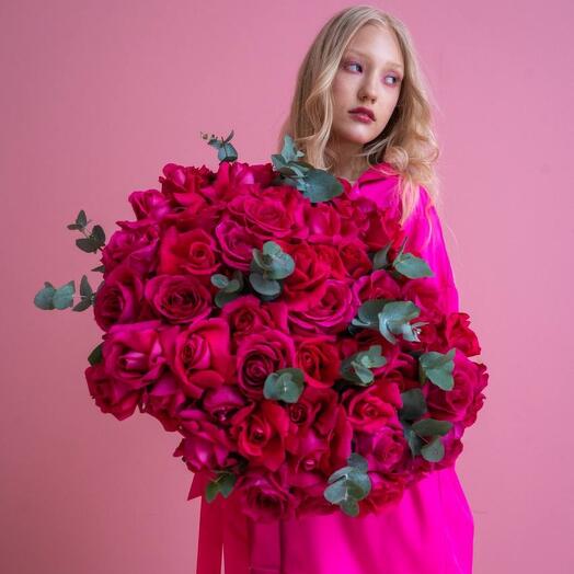 Bouquet of bright pink roses with eucalyptus from 45 pieces under the ribbon