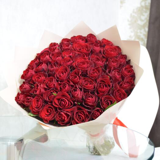 51 red roses in a white wrapper
