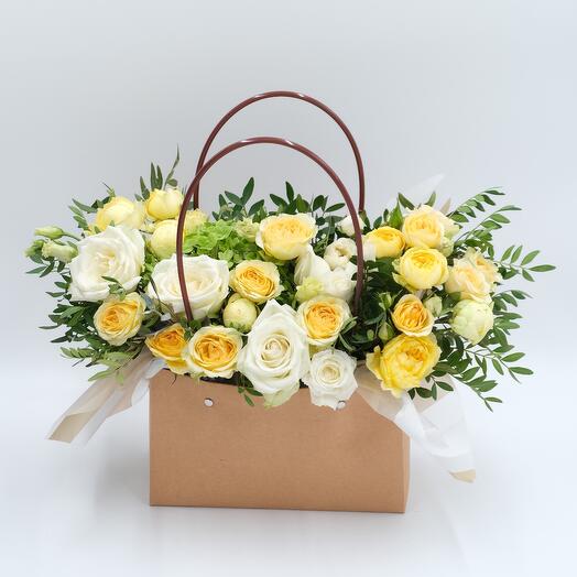 A composition in a handbag of roses
