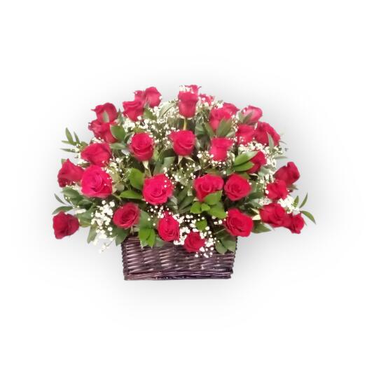 Love is in the air. Flowers in basket. Розы