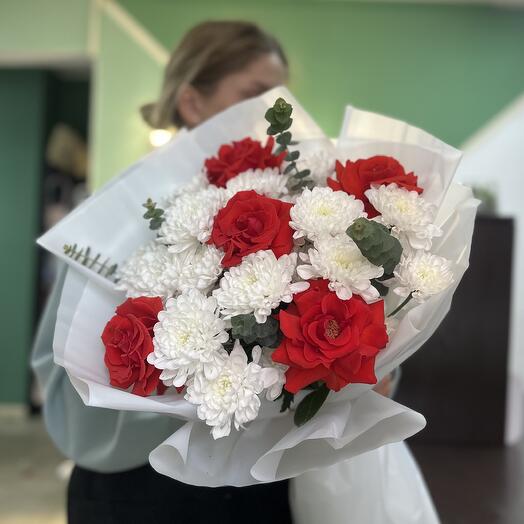 Bouquet "red classics" of bushy white chrysanthemums and red French roses with the addition of eucalyptus