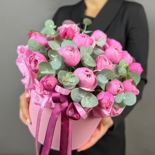 Bright composition of 3 pink peony-shaped Silva pink roses with eucalyptus