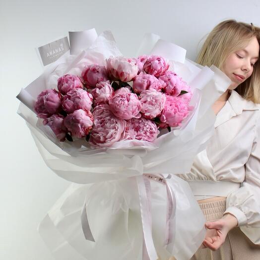Monobook made of soft pink peonies in a package