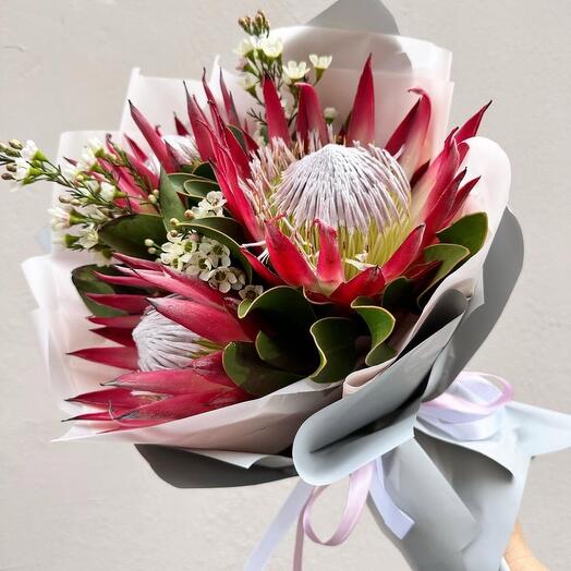 Pretty bouquet of protea and white oxypetalum