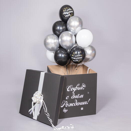 Черная коробка с вылетающими шарами