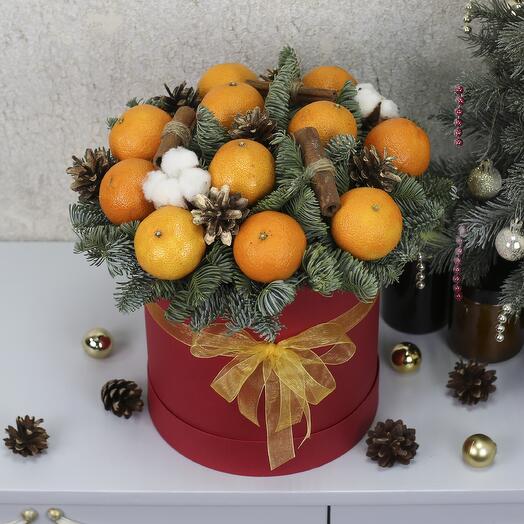 Christmas composition in a box with tangerines and nobilis "Mulled wine"