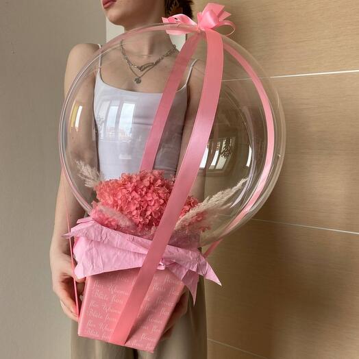 Tenderness is a large composition of delicate pink hydrangeas with cortaderia in a ball