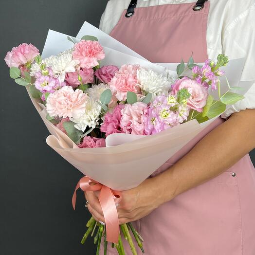 Bouquet of flowers. Pink Dianthuses, Eustoma and white bush Chrysanthemum